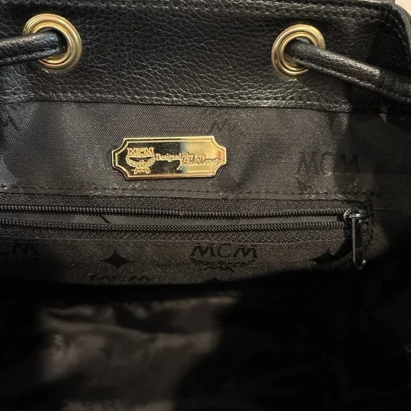 MCM Black Leather Backpack with Gold Accents - Picture 9 of 11